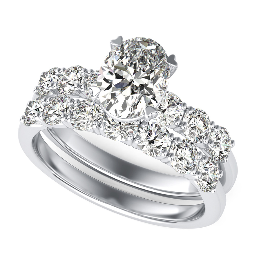 Engagement Ring With Side Stones Set In U Shape Prongs & Matching Band