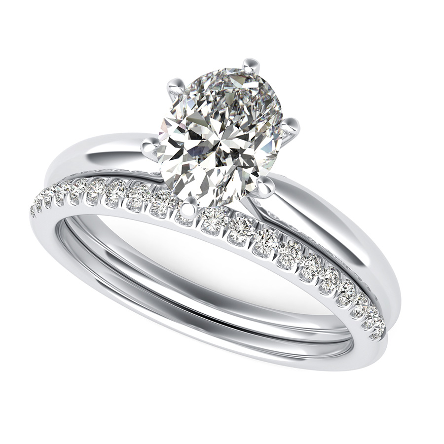 Delicate And Classic Solitaire Engagement Ring With Matching Band